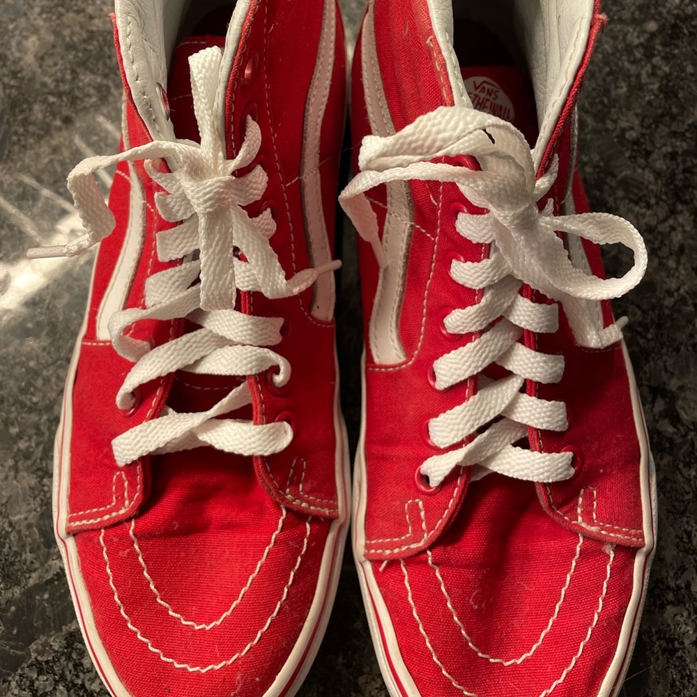 Red Vans high top women size 8 (men’s size 6.5)